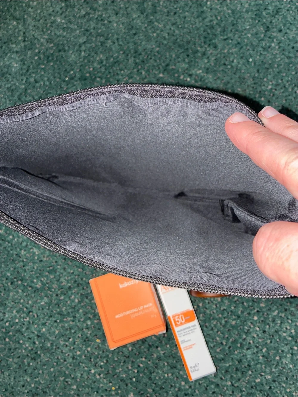 Ole Henriksen black leather